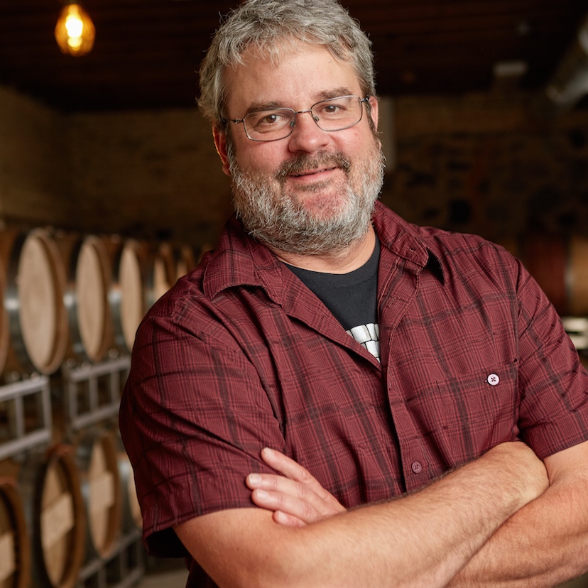 Bryan Ulbrich standing in The Barrel Room at Left Foot Charley